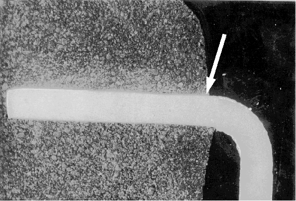 Lower magnification image of the lead and leadframe. (Courtesy Analytical Solutions).