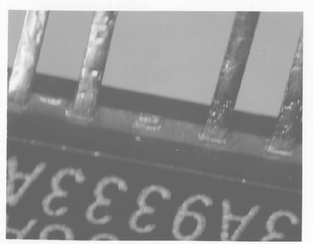 An example of a broken lead on an IC. (Photo courtesy Sandia Labs).